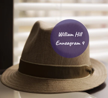 Brown fedora with the text William Hill Enneagram 4